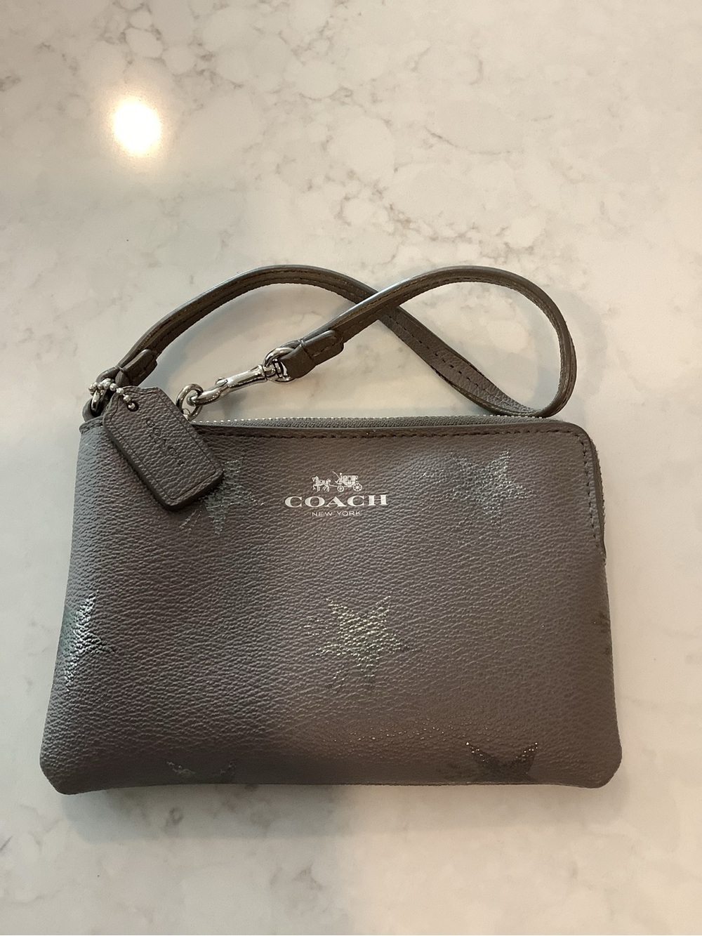 COACH Gray Star Print Leather Wristlet